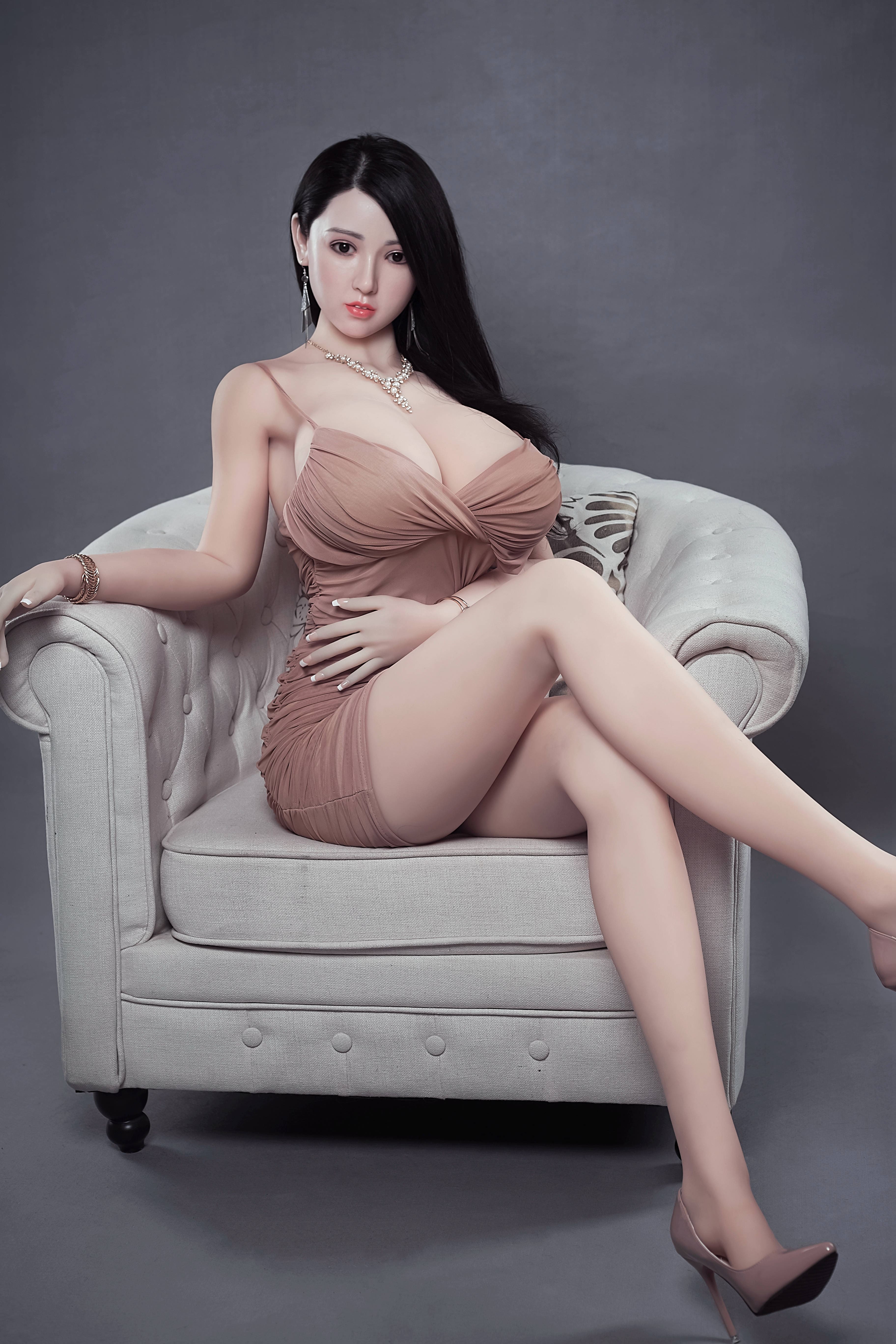 Realistic asian sex doll with huge tits and long leg