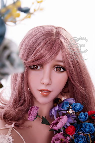 Anime inspired TPE sex doll with pink wig